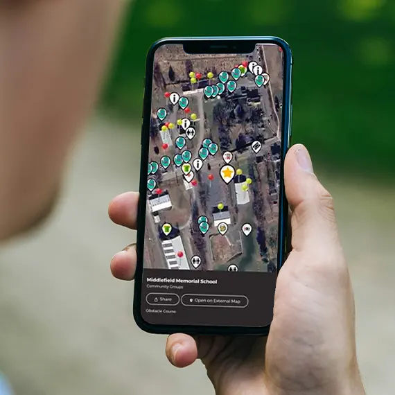 Smart phone showing map of Middlefield Memorial School with map pins
